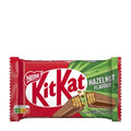A packaged KitKat 4 Fingers Hazelnut milk chocolate wafer bar by Nestlé, with the KitKat logo and hazelnut flavor indication.