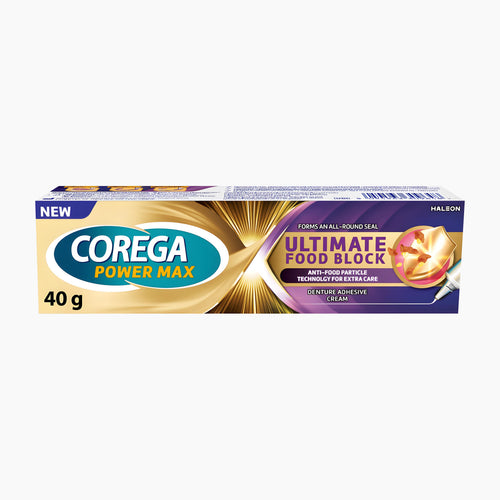 A 40 g box of Corega Power Max Ultimate Food Block denture adhesive cream, featuring a gold and purple design with a graphic of a food block being cut, on a white background.