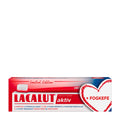 Lacalut Aktiv toothpaste + toothbrush kit packaging with a heart design on a white background