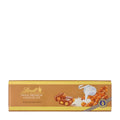 A bar of Lindt Swiss Premium Hazelnut milk chocolate, 300g, with whole roasted hazelnuts on the packaging.