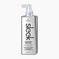 A bottle of Sleek Anti-Humidity Shine Coat hair protectant by Hair Chemist, featuring a sleek silver rectangular bottle with a clear spray top, set against a plain white background.