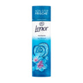 A container of Lenor April Fresh laundry perfume pearls with a blue design and floral graphics, indicating the product is for enhancing laundry scent.