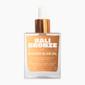 Bali Bronze Golden Glow Oil Multi-Purpose Dry Oil glass bottle on a light gray background.