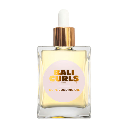 Bottle of Bali Curls curl bonding oil on a white background