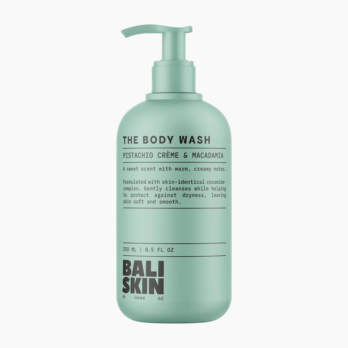 A mint green pump bottle of Bali Skin The Body Wash in Pistachio Crème & Macadamia scent, shown against a plain white background.