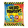 A package of Head Bangers Balls with 'Crazy Sour' raspberry and strawberry flavors. The packaging is primarily yellow and black with images of the candies and a cartoon of a character licking a candy.
