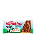 Packaging of Zetti Bambina milk chocolate butter caramel bar, featuring a white and green design with a cartoon cow and pieces of caramel with hazelnuts on the front.