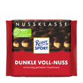 Packaging of Ritter Sport dark chocolate bar with whole hazelnuts.