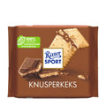Packaging of Ritter Sport Butter Biscuit milk chocolate bar, showing the chocolate bar, biscuits, and the text 'Knusperkeks' on a brown background.