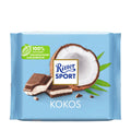 Packaging of Ritter Sport Coconut Milk Chocolate Bar, 100g, showing the bar and a halved coconut with the text 'KOKOS' on the bottom.