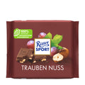 Packaging of Ritter Sport Raisin Hazelnut milk chocolate bar, showing the bar with pieces of hazelnut and raisins, and the Ritter Sport logo.