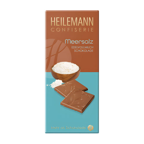 Heilemann Confiserie Sea salt milk chocolate packaging with a bowl of salt and chocolate bars on a white background