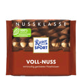 Packaging of Ritter Sport Nut Class Whole Hazelnut milk chocolate bar, showing the bar and the nuts inside.