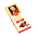Packaging of Reber Mozart Chocolade dark chocolate bar, 100 g, with an image of Mozart and the product visible through a clear window.