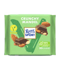 A Ritter Sport vegan crunchy almond chocolate bar, 100g, with the packaging displaying the product name and images of the chocolate bar with almond pieces.