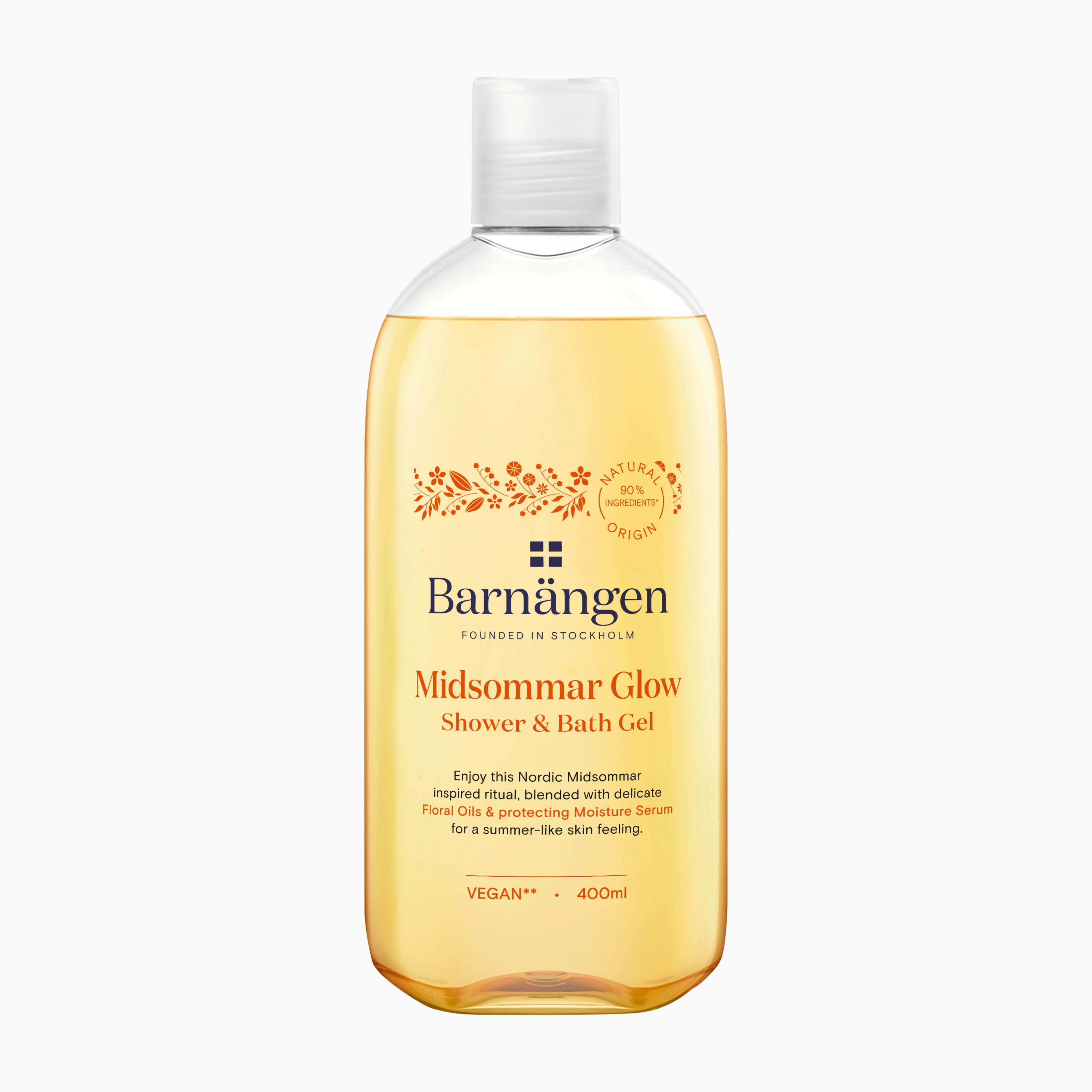 A 400ml clear plastic bottle of Barnangen Midsommar Glow Shower & Bath Gel, filled with a golden-yellow gel, on a clean white background.