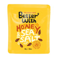 Yellow package of Better With Almonds Honey & Sea Salt on a white background