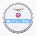 A round silver metal tin of Coconutoil Cosmetics Bio Cream Deo with a white label featuring a light blue band and a purple organic seal.