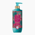 A bottle of Tesori d'Oriente Ayurveda Aromatic body lotion, featuring a turquoise and gold pump bottle with a colorful floral label, set against a plain white background.