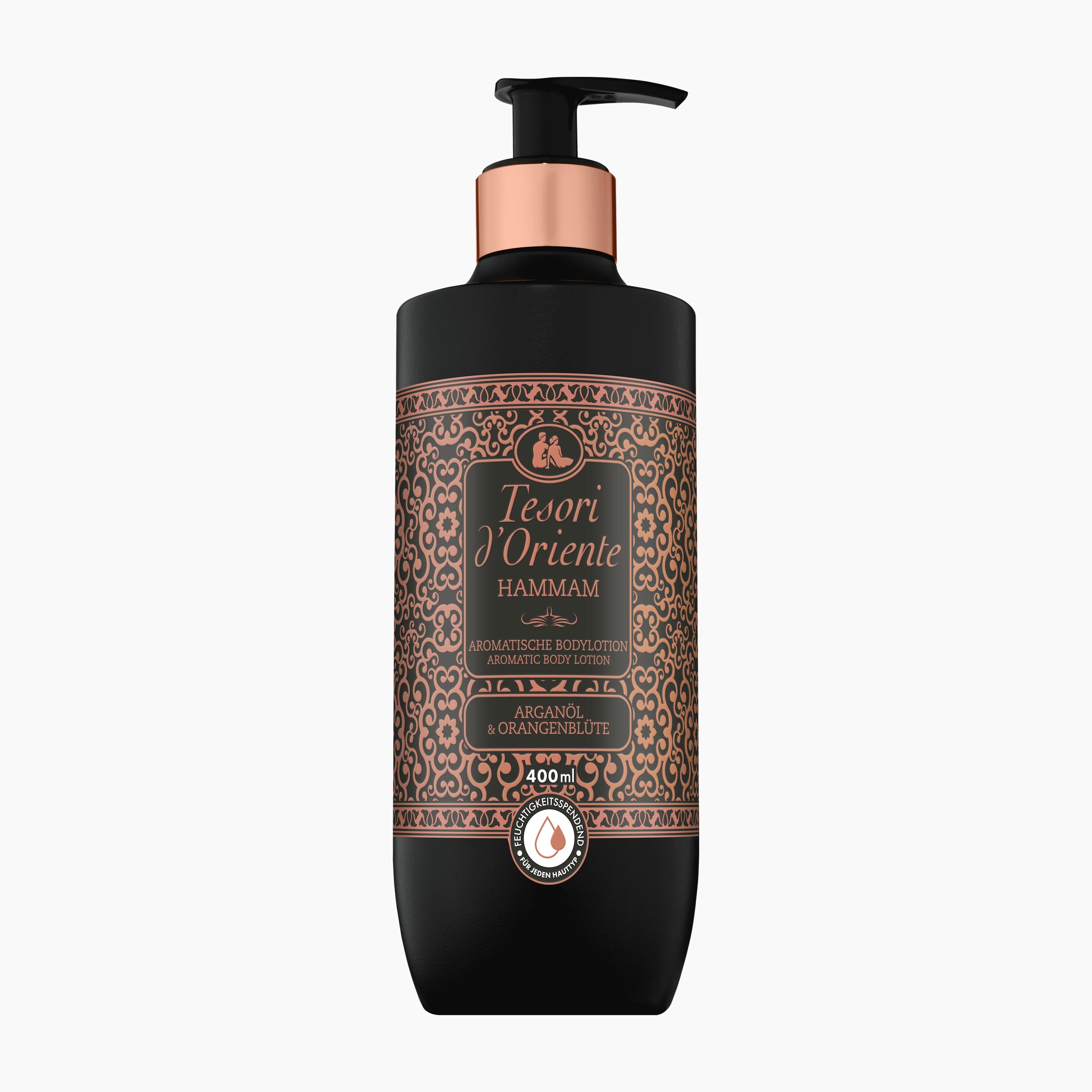 A 400ml pump bottle of Tesori d'Oriente Hammam body lotion. The bottle is matte black with a metallic rose gold collar and a detailed brown and gold ornate label.