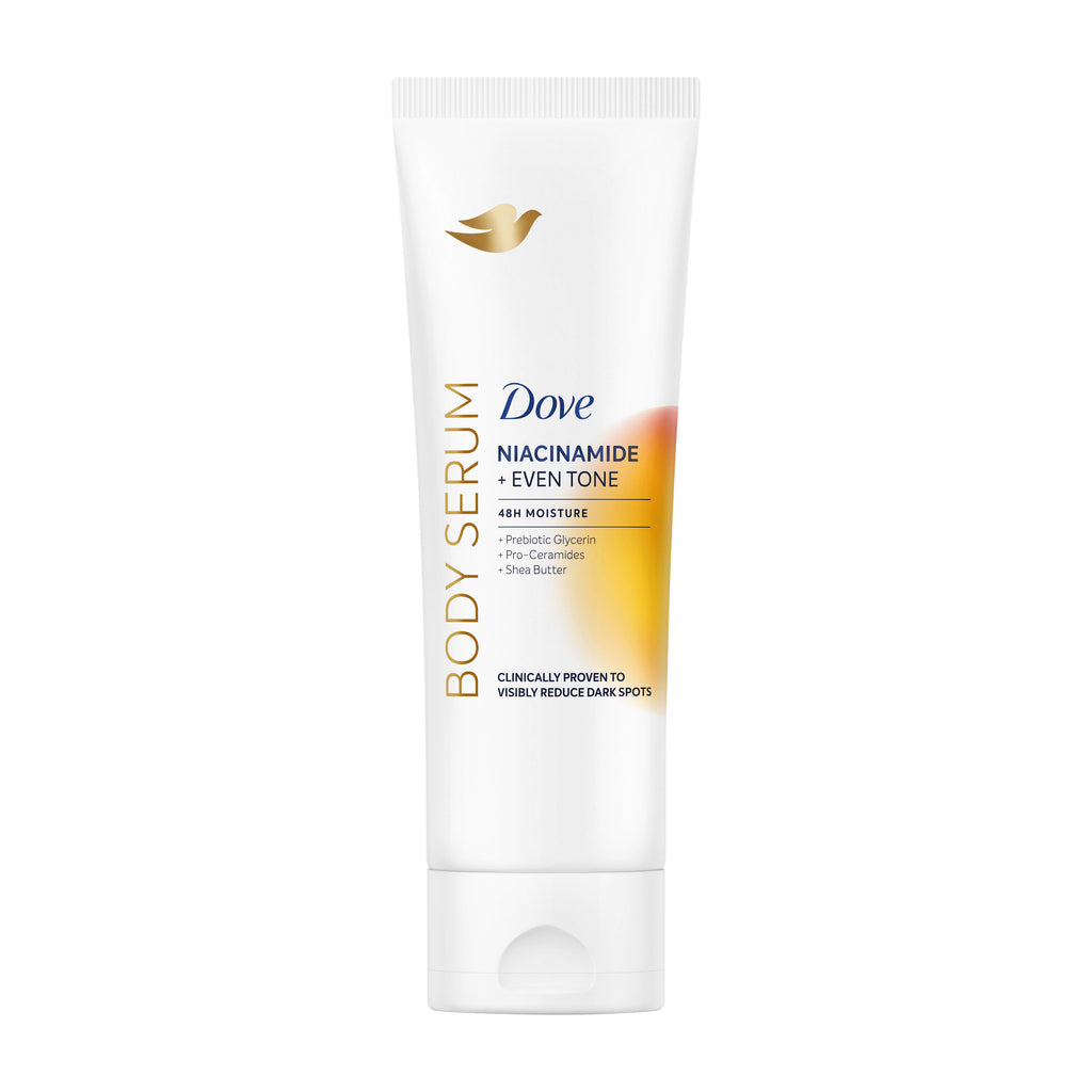 Dove Niacinamide + Even Tone body serum tube on a white background