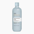 A 500 mL bottle of Baylis & Harding Kindness+ Hyaluronic Acid body wash, featuring a pale blue-gray bottle and a white label with gold and black text, set against a plain light gray background.
