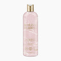 A bottle of Baylis & Harding Elements body wash in 'Pink Blossom & Lotus Flower' scent, featuring a light pink marble-textured bottle with gold lettering and a gold cap, set against a plain white background.