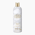 A 500ml bottle of Baylis & Harding Elements White Tea & Neroli luxury body wash, featuring a white marble pattern with gold lettering and a gold cap, set against a plain white background.