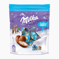 A package of Milka Bonbons Confetti with milk chocolate eggs visible through a star-shaped window on the front of the bag.