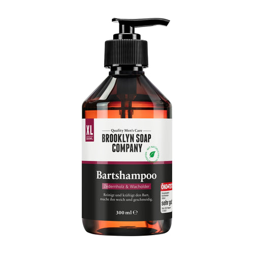 Pump bottle of Brooklyn Soap Company beard shampoo on a white background