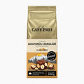 A 200g bag of Cafe Frei Torino Hazelnut-Chocolate ground coffee, featuring a metallic gold upper half and a cream and brown lower half with illustrations of chocolate and hazelnuts.