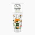 A tube of Caola Chamomile & Calendula hand balm featuring illustrations of chamomile and calendula on a white background.