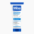 A squeeze tube of Mixa Sensitive Skin Expert Ceramide Protect hand cream, featuring a white body with blue text and branding, set against a plain white background.