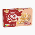Nestlé Choco Crossies White chocolate-coated cross-shaped cookies in a red and beige box, with a photo of the white-coated cookies on the front and text reading 'Mit Herz aus Hamburg'.