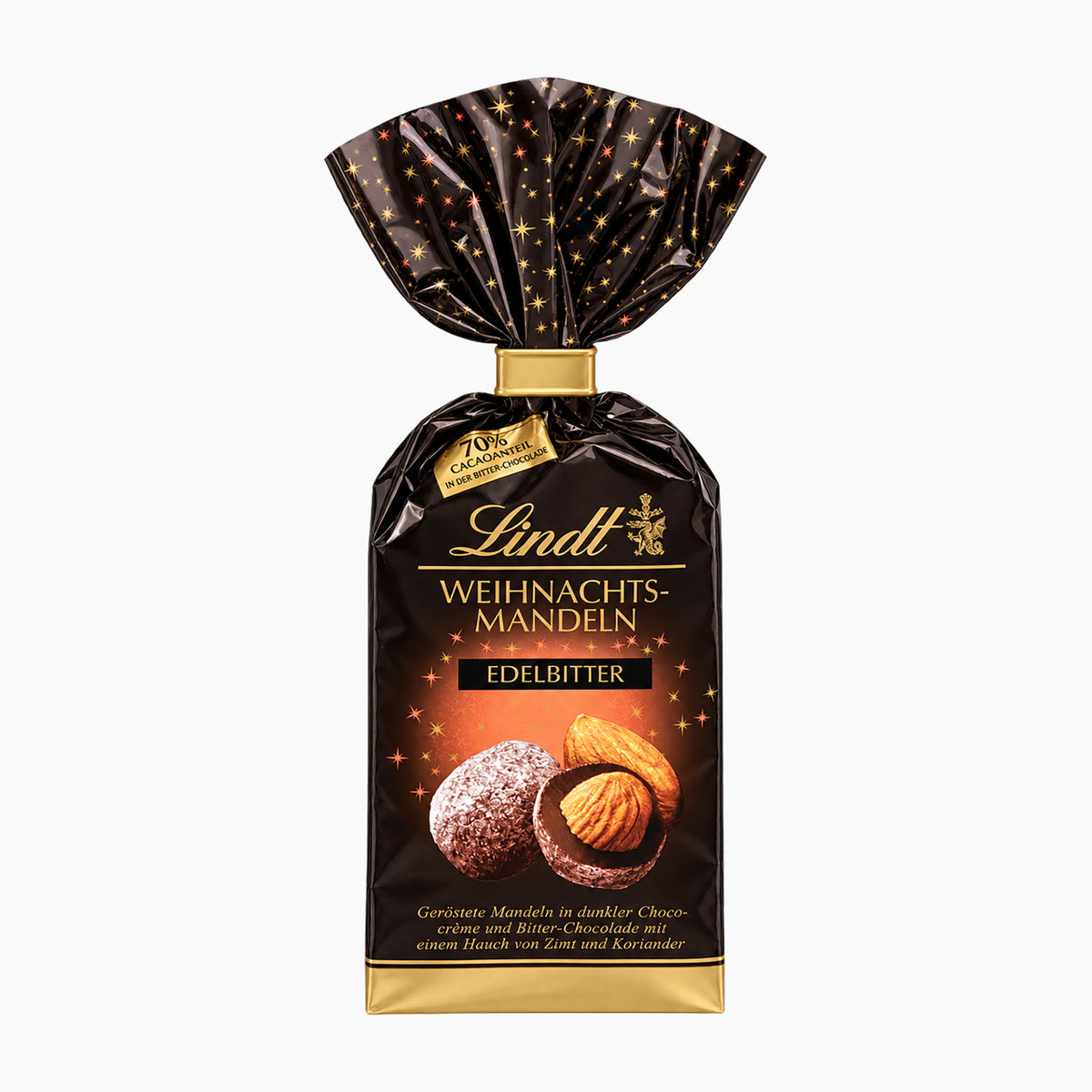 A package of Lindt Christmas Almonds Dark Chocolate in a glossy black bag with gold foil accents, a gold neck band, and a printed front label showing chocolate-covered almonds and almonds with cream.