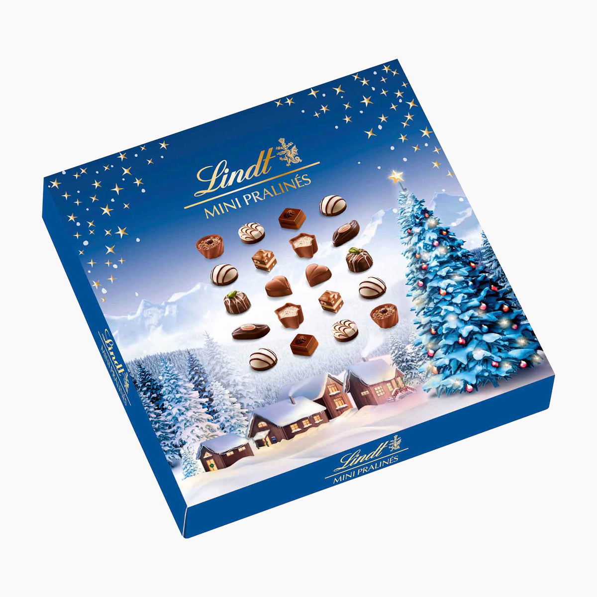 Lindt Christmas Magic Mini Pralines chocolate box with a winter Christmas theme, featuring mini chocolates and a snowy village scene on a light gray background.