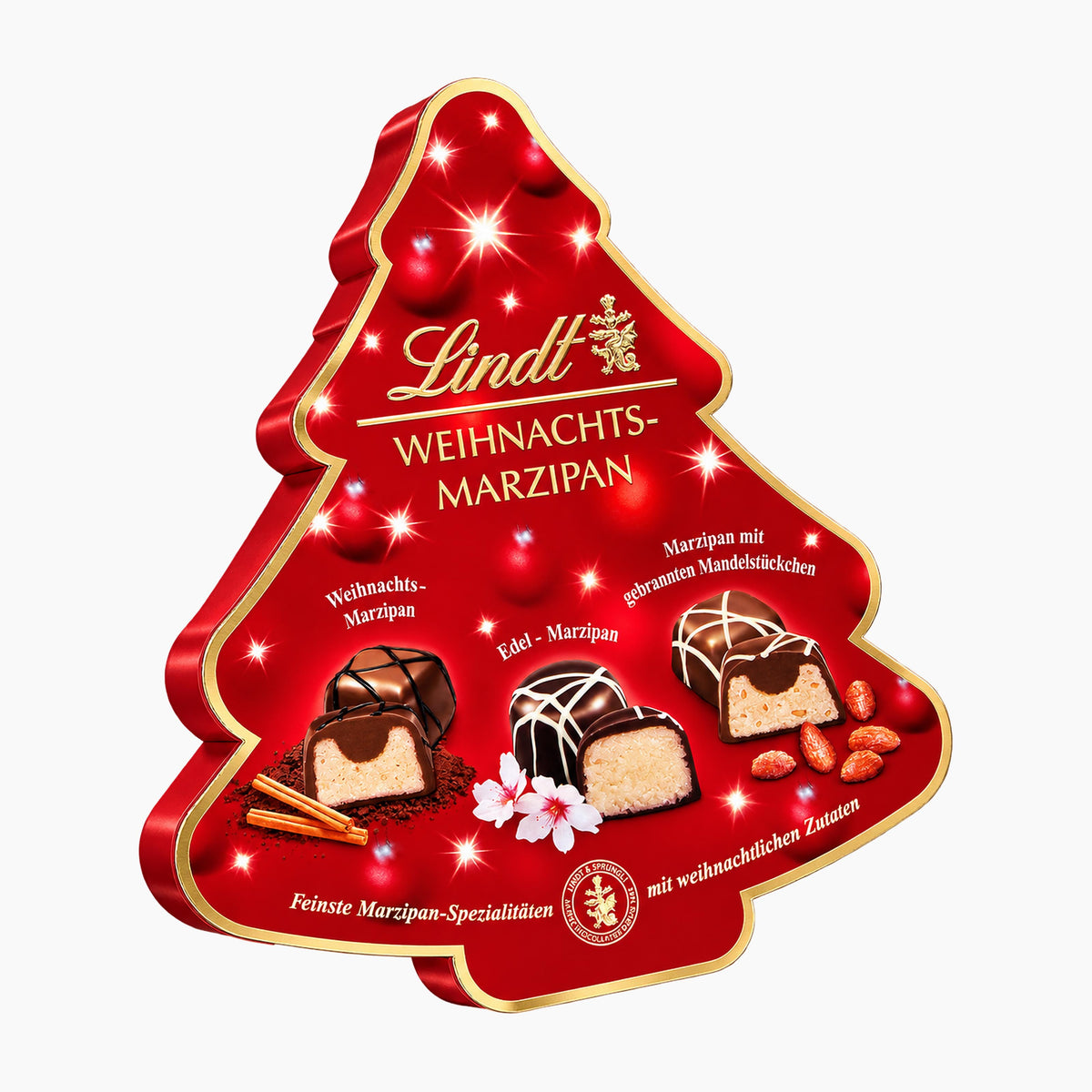 Lindt Weihnachts-Marzipan Christmas Marzipan Selection pralines box shaped like a Christmas tree, featuring three decorated chocolate pieces and almonds on a light gray background.