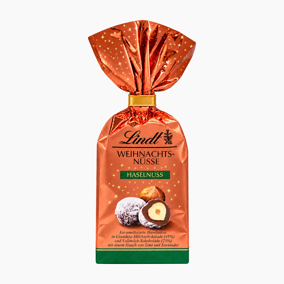 A package of Lindt Christmas Nuts Hazelnut in a metallic copper-orange bag with a gold foil top and green base, shown on a plain white background.