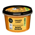 A container of organic shop Cinnamon & Honey Rejuvenating Body Scrub with the lid on, against a white background.