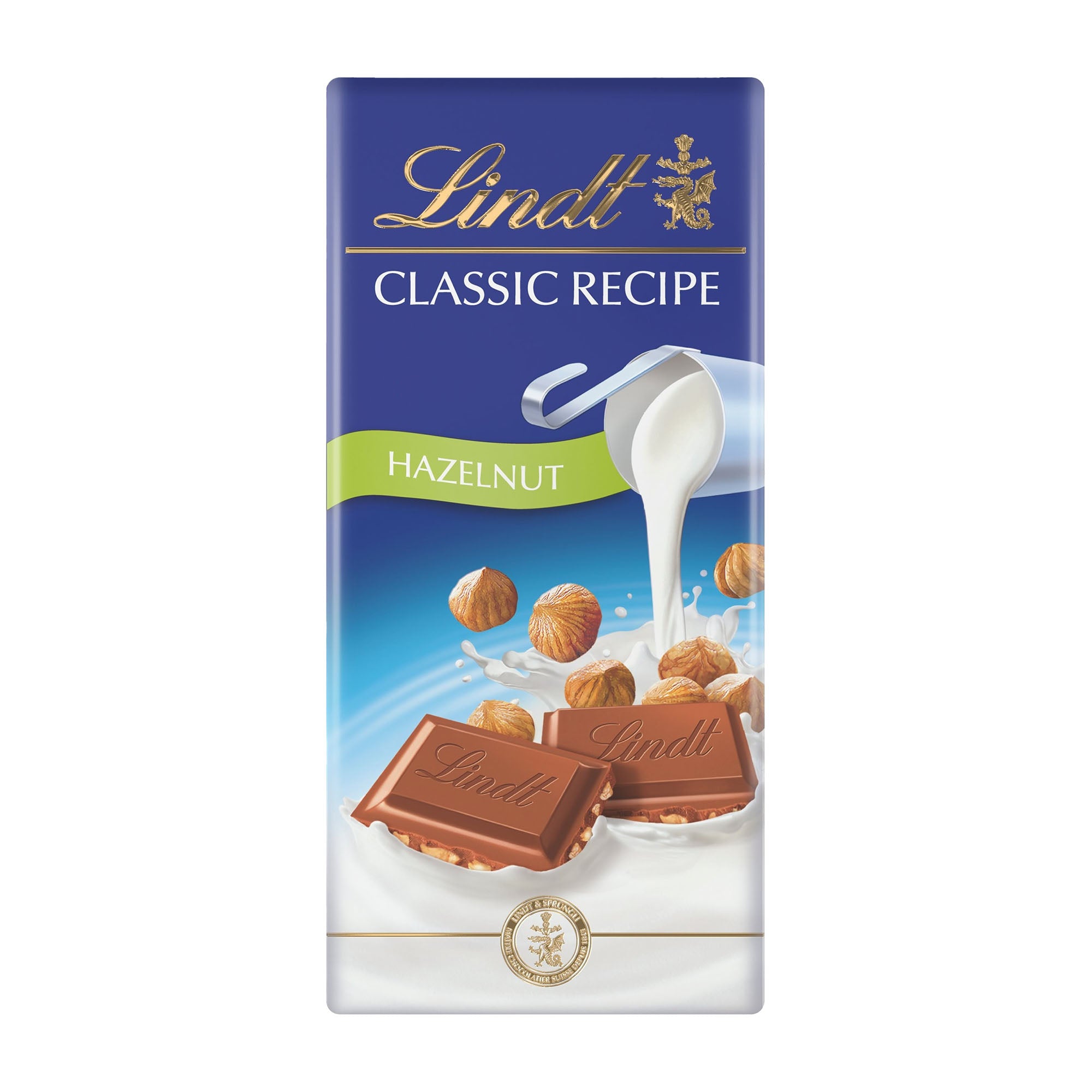 Packaging of Lindt Classic Recipe hazelnut milk chocolate bar, showing the bar and pieces of hazelnut with the Lindt logo and the phrase 'Classic Recipe' on the top.