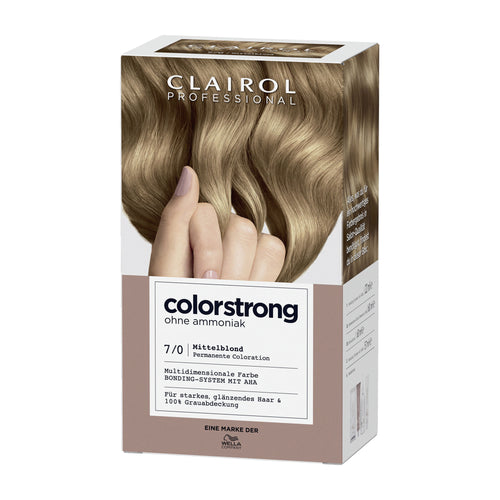 Clairol Professional Colorstrong hair color box with a hand holding medium blonde hair on a white background