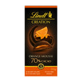Packaging of Lindt Creation Orange Mousse 70% dark chocolate bar with an image of the chocolate bar and orange slices, and the weight indication of 150g.