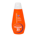 A bottle of Creme 21 Intensive Hydrating Body Lotion with orange packaging.