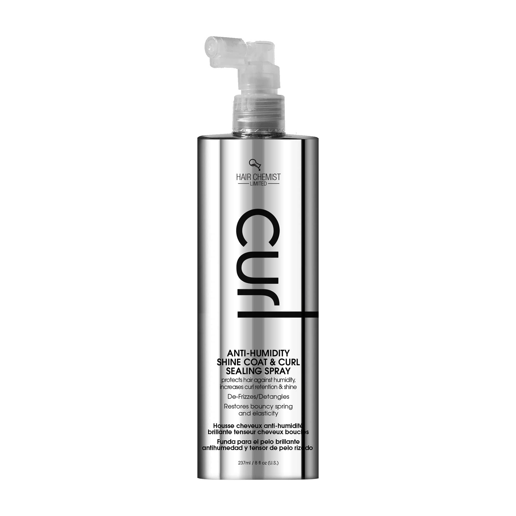 A bottle of Hair Chemist curl Anti-humidity shine coat & curl sealing spray, with a pump dispenser, predominantly silver in color with black and white text.