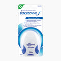 A package of Sensodyne Expanding Floss, 50m length, in its original retail blister card packaging. The floss container is white with blue accents, and the packaging features blue and green branding elements on a clean white background.