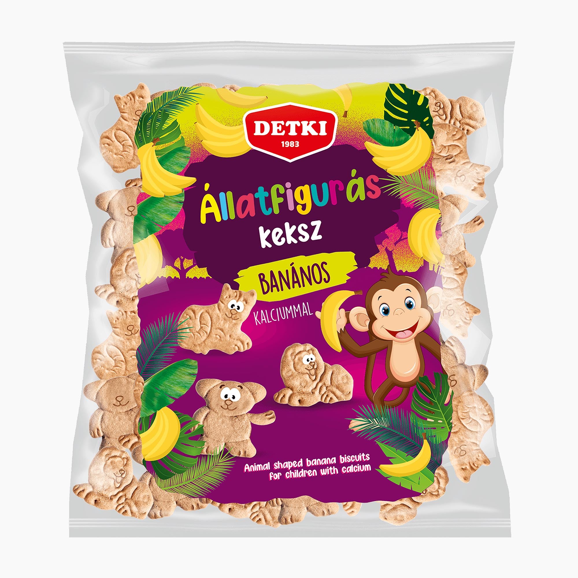 A bag of Detki animal-shaped banana biscuits for children, featuring a colorful cartoon design with bananas, monkeys, and bears on a purple background.