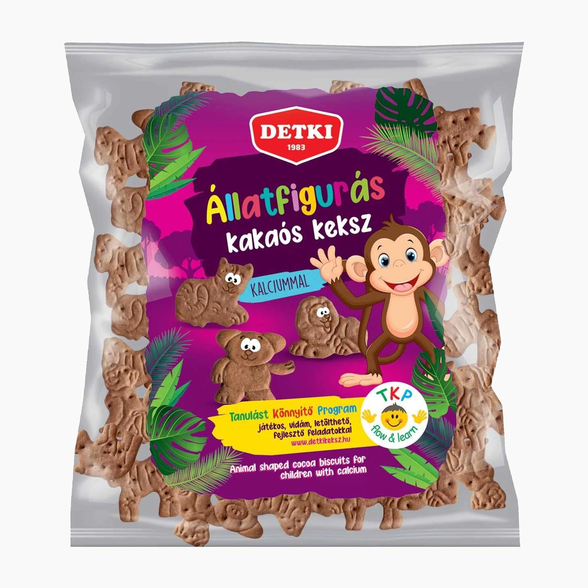 A bag of Detki Animal-shaped cocoa biscuits featuring a colorful cartoon monkey label on a white background.