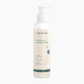 Dora Natura Fragrance-Free Intimate Wash pump bottle on a light gray background.