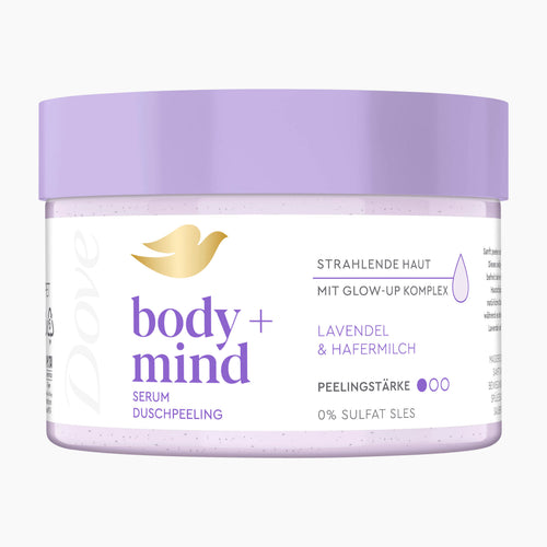 Dove body + mind Lavender & Oat Milk serum body scrub in a clear plastic jar with a lavender purple lid and white label, featuring a gold dove logo.