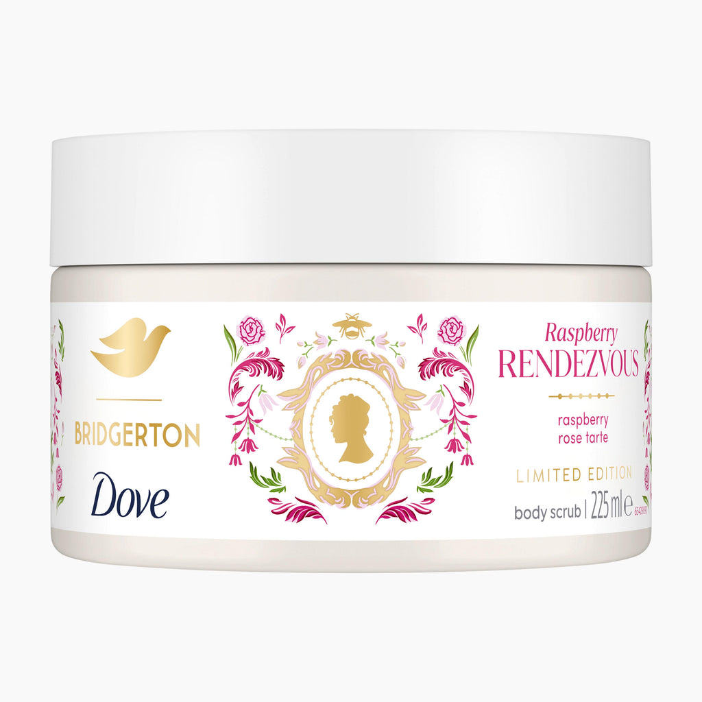 A white jar of Dove Bridgerton Raspberry Rendezvous body scrub, featuring a decorative label with gold, pink, and green accents, on a light gray background.